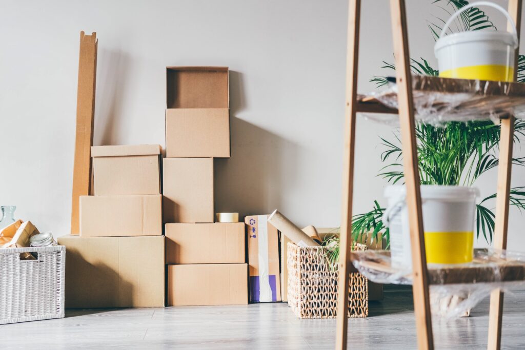 Moving to a new home. Belongings in cardboard boxes.